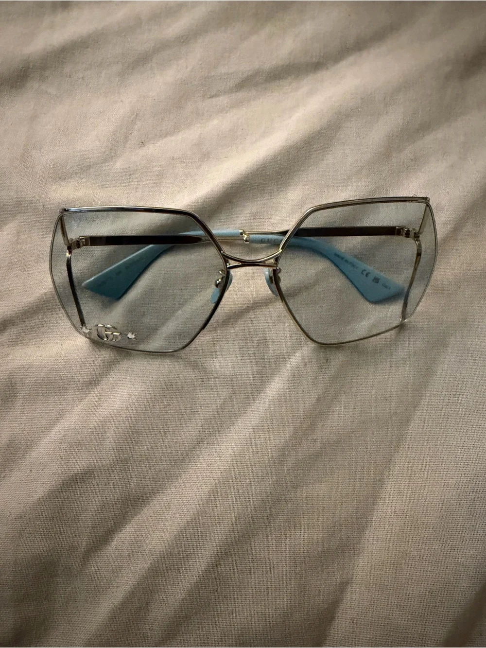 Gucci Gold Rim Sunglasses with Light Blue lens